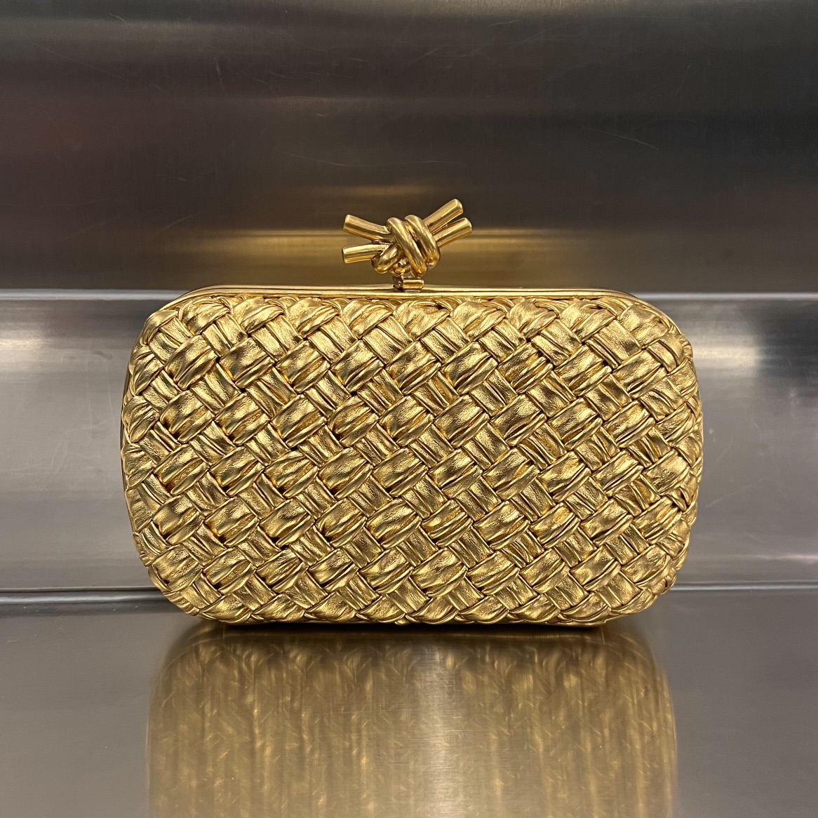 Knot Padded Intreccio Leather Clutch Gold